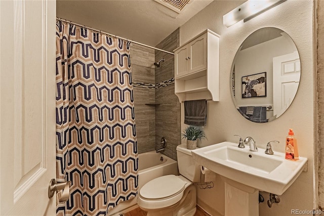 7945 York St Unit 2, Denver, CO 80229 - bathroom featuring toilet and shower / tub combo with curtain