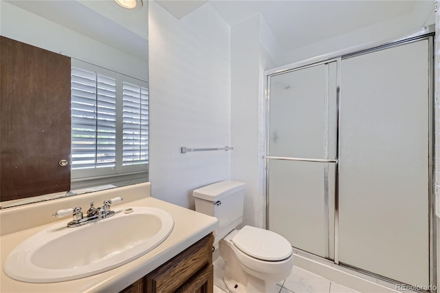 full bathroom with a stall shower, tile patterned flooring, vanity, and toilet