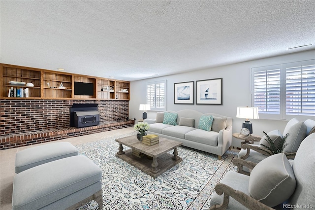 living area with a textured ceiling