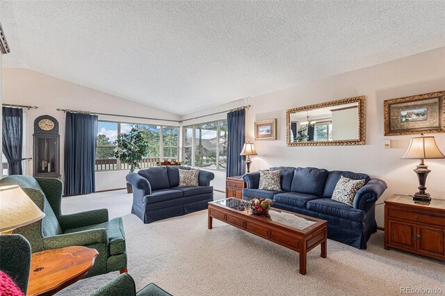 1095 Lake Woodmoor Dr, Monument, CO 80132 - living area with light colored carpet, a textured ceiling, and lofted ceiling