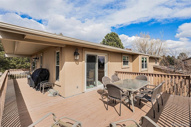 1095 Lake Woodmoor Dr, Monument, CO 80132 - deck featuring outdoor dining space and grilling area