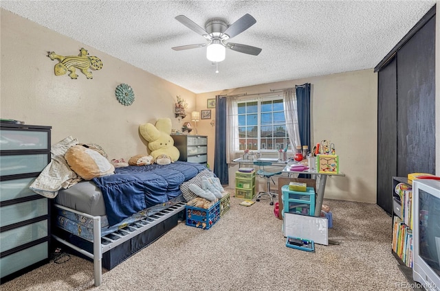 14034 E Utah Cir, Aurora, CO 80012 - carpeted bedroom with a textured ceiling and a ceiling fan