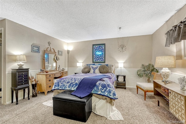 14034 E Utah Cir, Aurora, CO 80012 - bedroom with a textured ceiling, carpet, and wainscoting