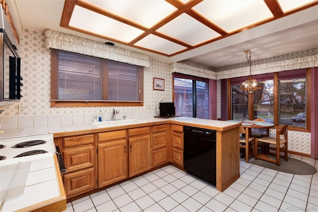 7500 E Dartmouth Ave Unit 16, Denver, CO 80231 - kitchen featuring wallpapered walls, dishwasher, a sink, tile countertops, and a chandelier