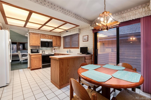 7500 E Dartmouth Ave Unit 16, Denver, CO 80231 - kitchen featuring electric stove, freestanding refrigerator, wallpapered walls, light tile patterned floors, and a peninsula