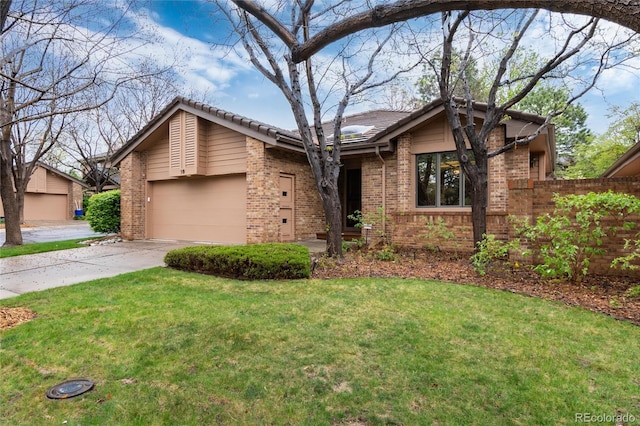 7500 E Dartmouth Ave Unit 16, Denver, CO 80231 - mid-century home featuring brick siding, concrete driveway, and a garage