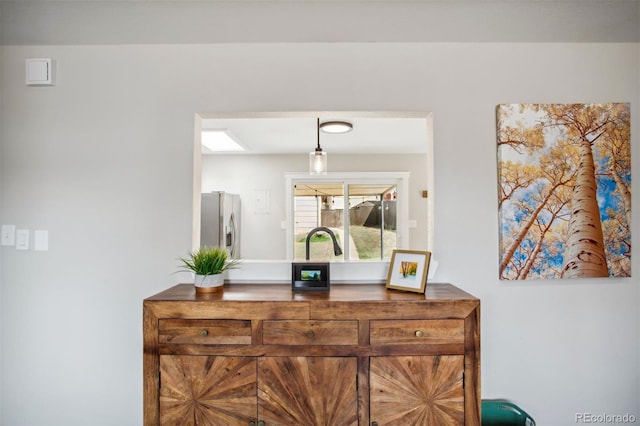 room details with stainless steel fridge