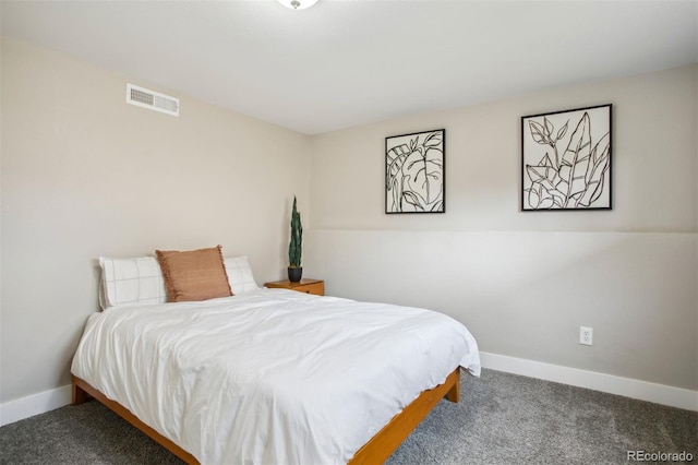 bedroom featuring baseboards, visible vents, and carpet floors