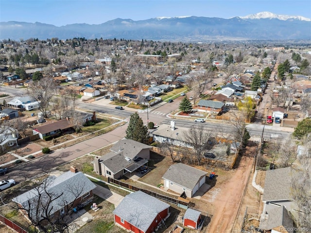 drone / aerial view with a residential view and a mountain view