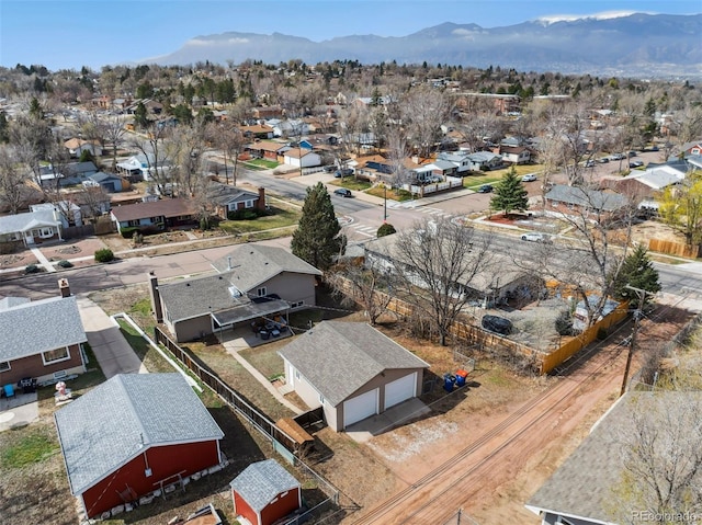bird's eye view featuring a residential view and a mountain view