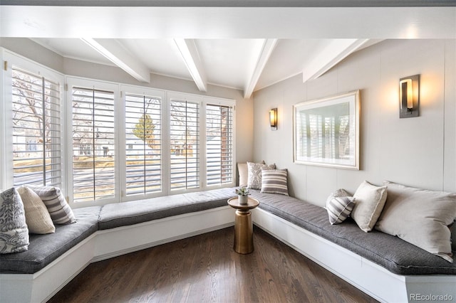 living area with dark wood finished floors and beamed ceiling