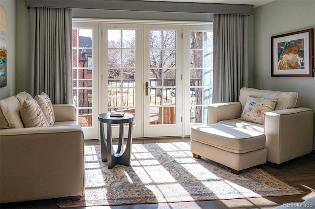 290 Dexter St, Denver, CO 80220 - living area featuring plenty of natural light and wood finished floors