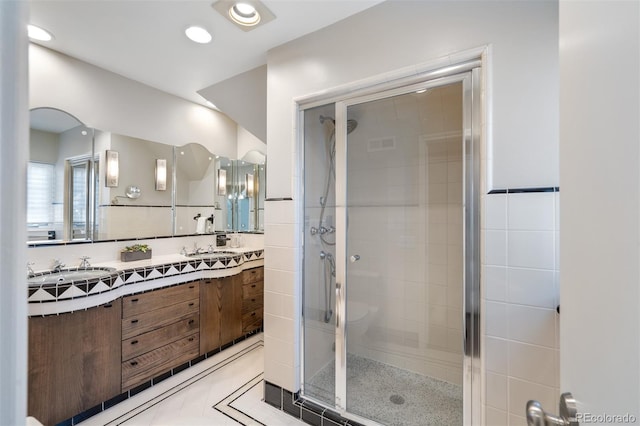 290 Dexter St, Denver, CO 80220 - full bath with double vanity and a shower stall