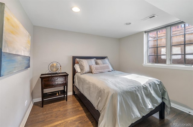 290 Dexter St, Denver, CO 80220 - bedroom featuring multiple windows, wood finished floors, and recessed lighting