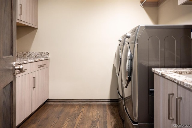 290 Dexter St, Denver, CO 80220 - laundry room with cabinet space, washer and dryer, and dark wood-style flooring