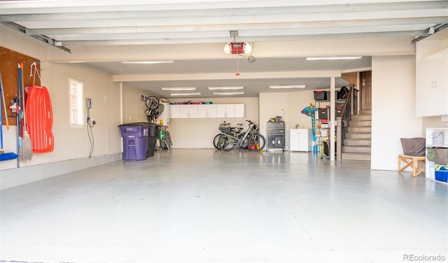 290 Dexter St, Denver, CO 80220 - garage featuring a garage door opener