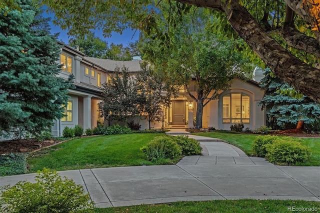 view of front of house with a front lawn