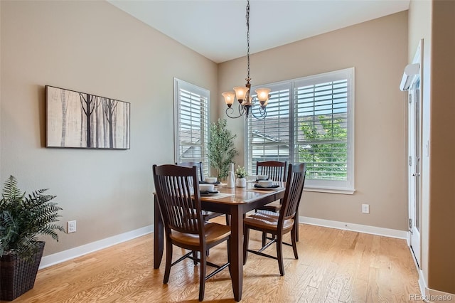 15852 Lavender Pl, Broomfield, CO 80023 - dining room with light wood-type flooring and a chandelier