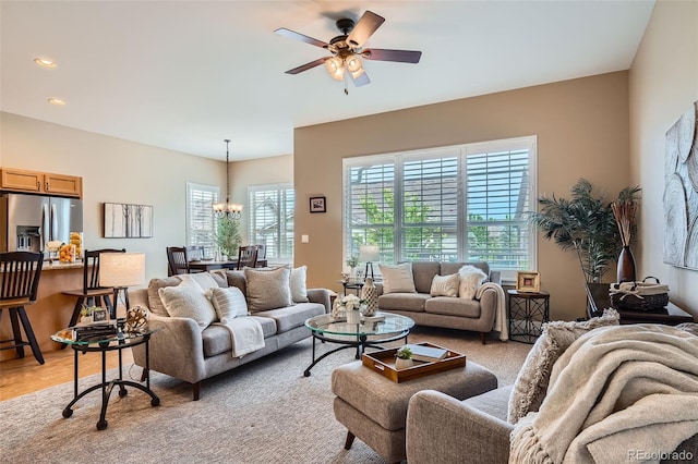 15852 Lavender Pl, Broomfield, CO 80023 - living area with a ceiling fan and a chandelier