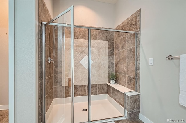 15852 Lavender Pl, Broomfield, CO 80023 - bathroom with a stall shower and baseboards