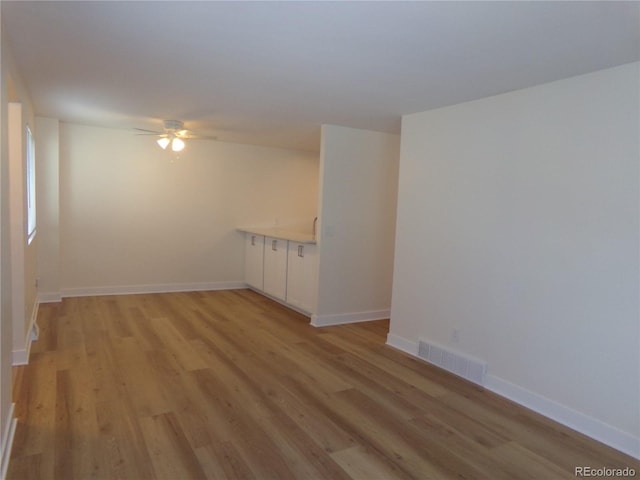 interior space featuring ceiling fan and light hardwood / wood-style floors