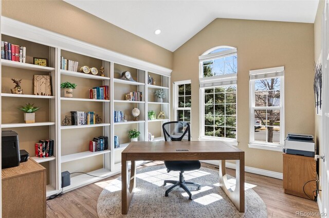 11991 Hazy Hills Dr, Parker, CO 80138 - office featuring light wood-style flooring, baseboards, and vaulted ceiling