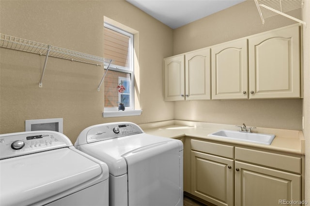 11991 Hazy Hills Dr, Parker, CO 80138 - washroom featuring a sink, cabinet space, and washer and dryer