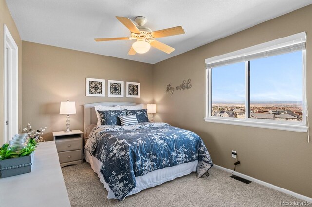 11991 Hazy Hills Dr, Parker, CO 80138 - carpeted bedroom featuring visible vents, baseboards, and ceiling fan