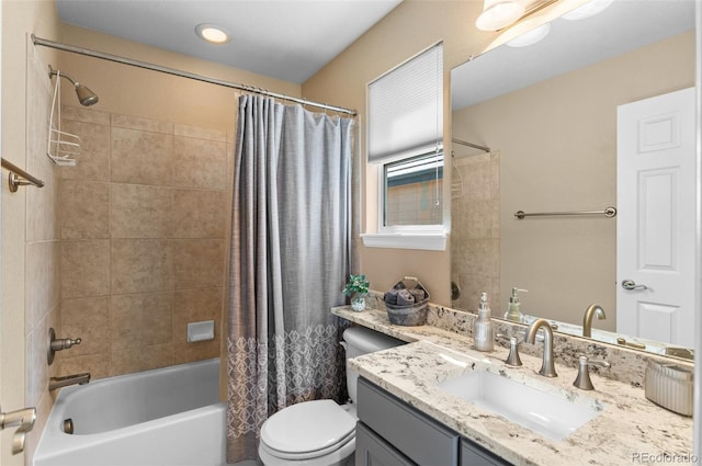 11991 Hazy Hills Dr, Parker, CO 80138 - bathroom featuring shower / bath combo with shower curtain, vanity, and toilet