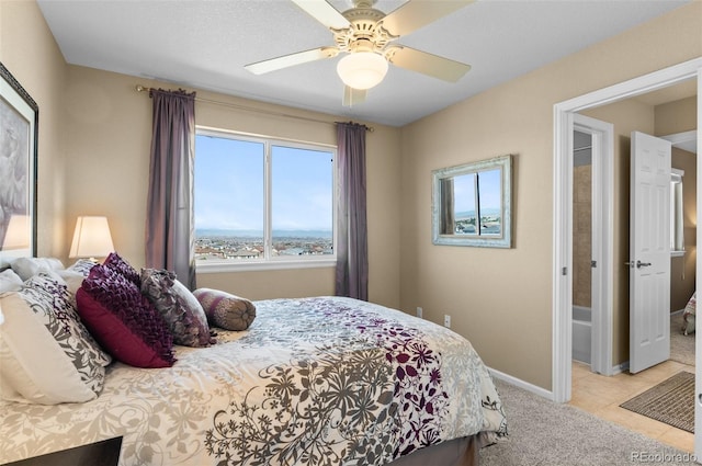 11991 Hazy Hills Dr, Parker, CO 80138 - bedroom featuring light colored carpet, multiple windows, baseboards, and a ceiling fan