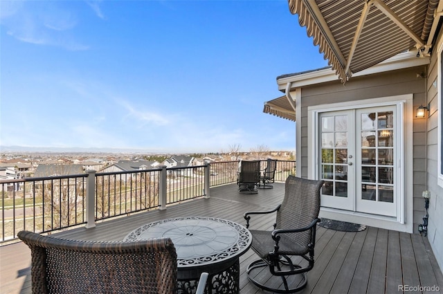11991 Hazy Hills Dr, Parker, CO 80138 - wooden terrace featuring outdoor dining space and french doors