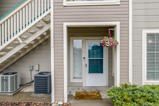 property entrance featuring central air condition unit