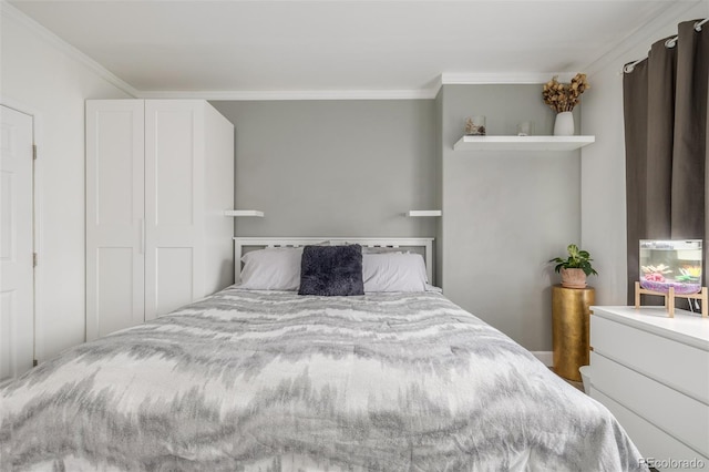 bedroom with crown molding
