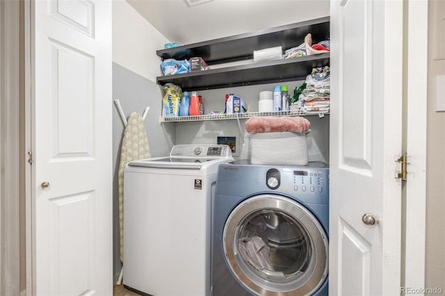 laundry area featuring washer and dryer