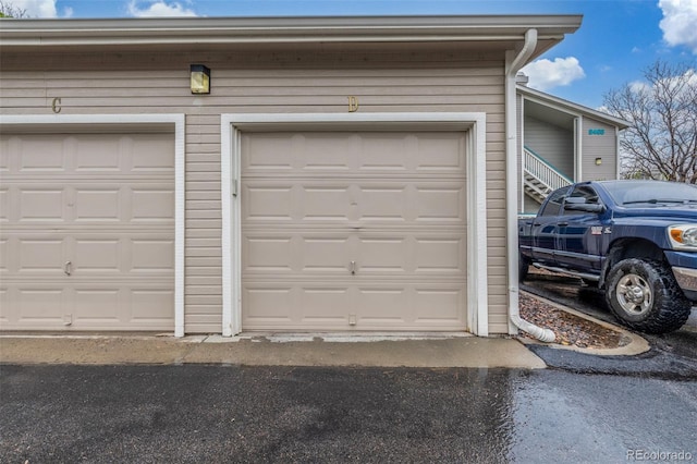 garage with driveway