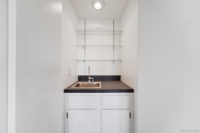 bar with a sink and wet bar
