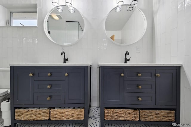 31551 Black Widow Dr, Conifer, CO 80433 - bathroom featuring two vanities