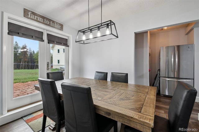 31551 Black Widow Dr, Conifer, CO 80433 - dining area with wood finished floors