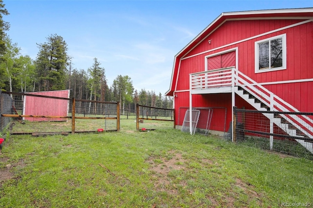 31551 Black Widow Dr, Conifer, CO 80433 - view of yard with a barn