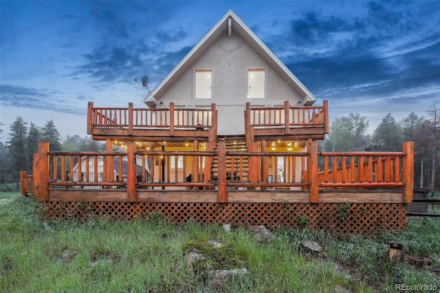 31551 Black Widow Dr, Conifer, CO 80433 - back of property featuring a deck and stucco siding
