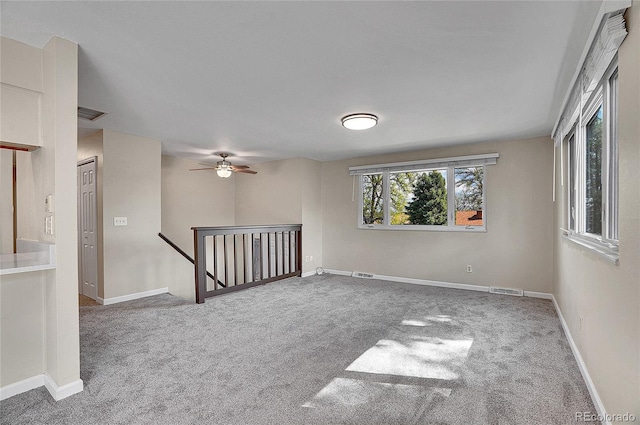 9099 W Harvard Pl, Lakewood, CO 80227 - unfurnished room with carpet flooring, baseboards, and ceiling fan