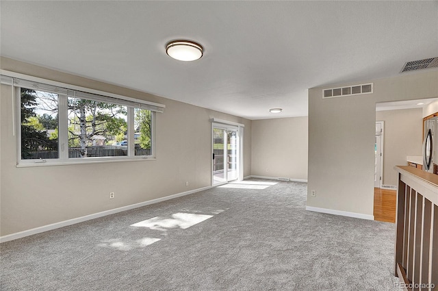 9099 W Harvard Pl, Lakewood, CO 80227 - carpeted spare room with baseboards