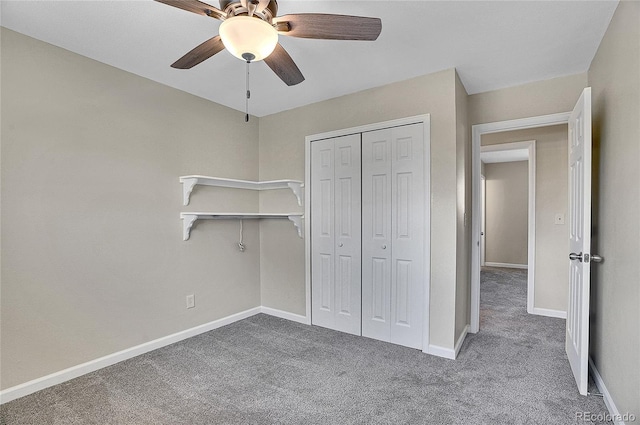 9099 W Harvard Pl, Lakewood, CO 80227 - unfurnished bedroom featuring carpet flooring, baseboards, a closet, and a ceiling fan
