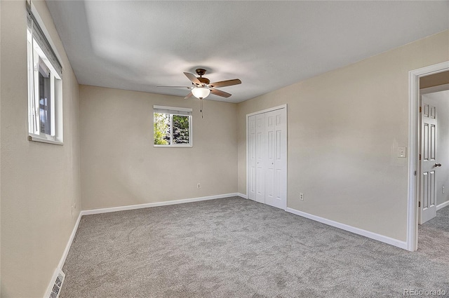 9099 W Harvard Pl, Lakewood, CO 80227 - unfurnished bedroom featuring carpet floors, baseboards, a closet, and a ceiling fan