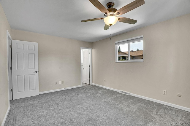 9099 W Harvard Pl, Lakewood, CO 80227 - unfurnished room featuring a ceiling fan, carpet, and baseboards