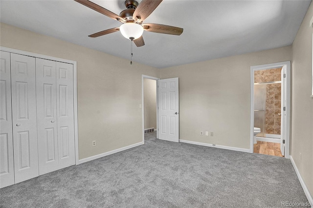 9099 W Harvard Pl, Lakewood, CO 80227 - unfurnished bedroom with carpet flooring, baseboards, a closet, and ensuite bath