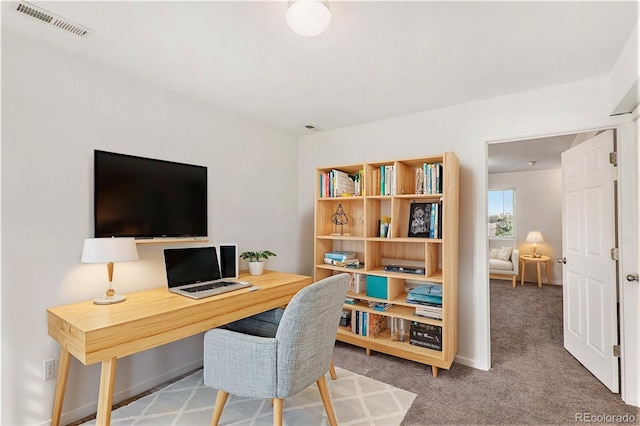 view of carpeted home office