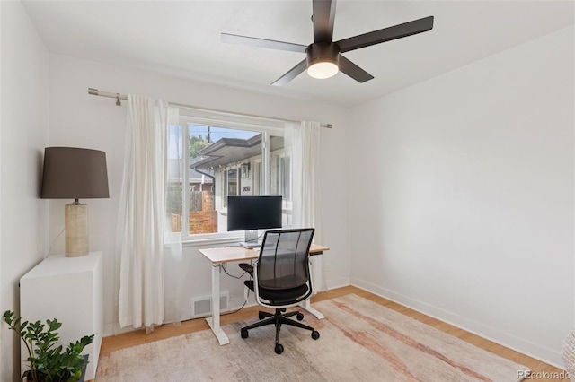 3440 N Harrison St, Denver, CO 80205 - office area with light wood-type flooring and ceiling fan