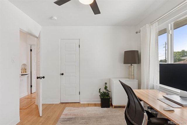 3440 N Harrison St, Denver, CO 80205 - home office featuring ceiling fan and light wood-type flooring