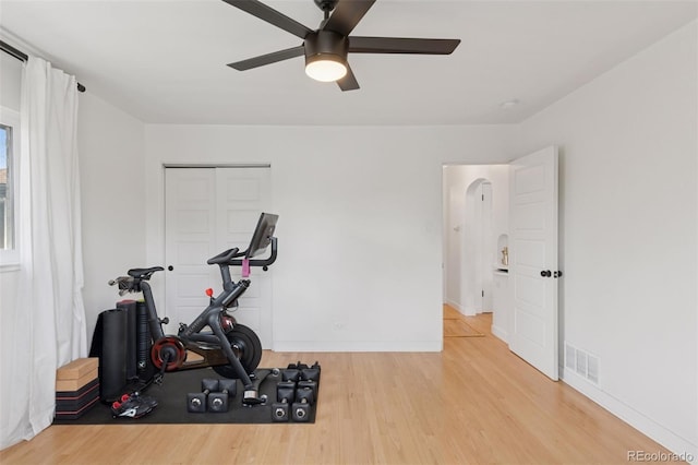 3440 N Harrison St, Denver, CO 80205 - exercise area with ceiling fan, wood finished floors, and arched walkways